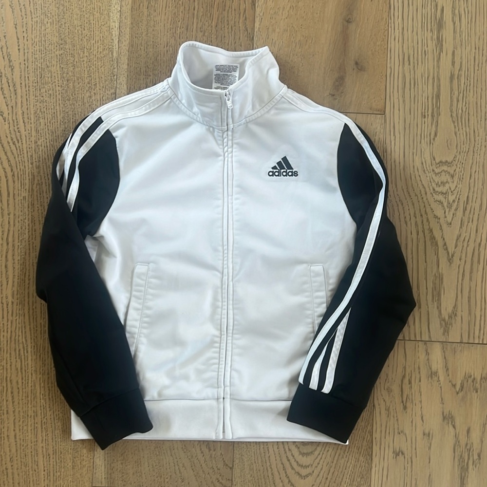 Adidas full zip jacket. White body with black sleeves. Size youth small (8).
